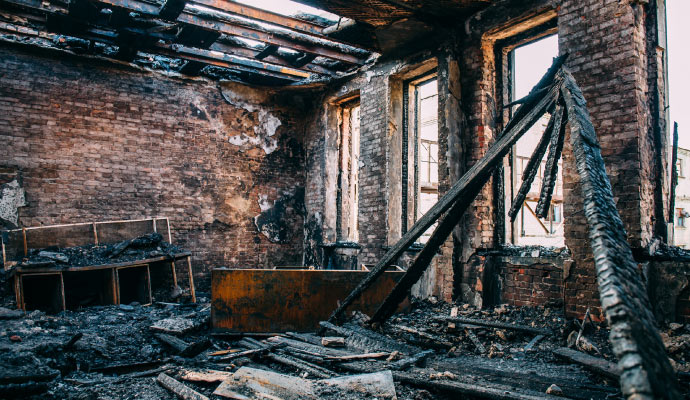 A room severely damaged by fire