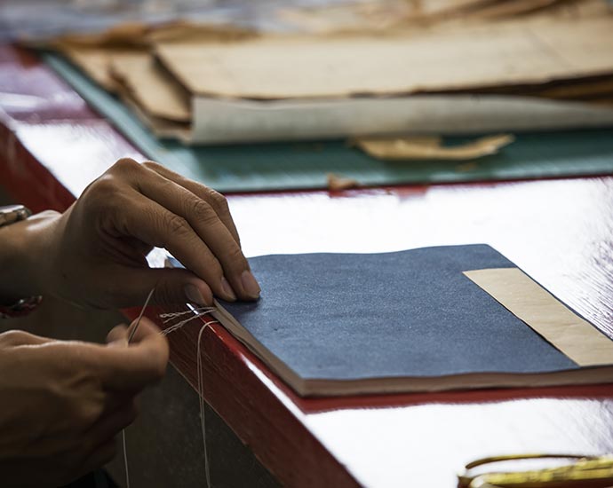 Person repairing a book