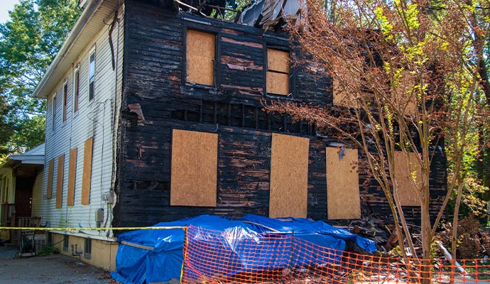Fire damage board-up house