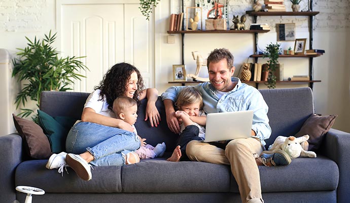 happy family relaxing at home indoor air quality