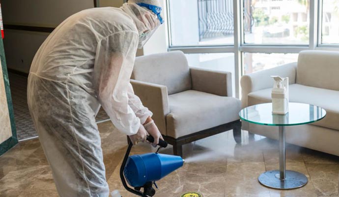 professional man wear uniform disinfection service