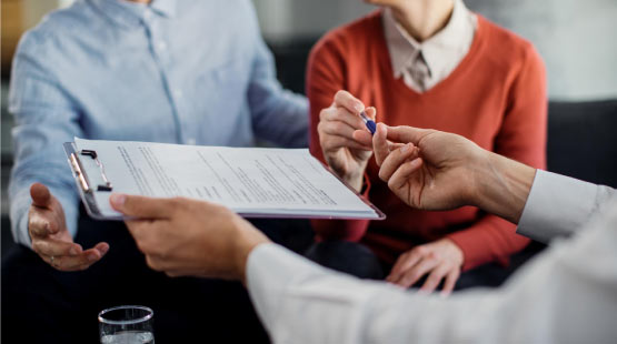 signing insurance paper