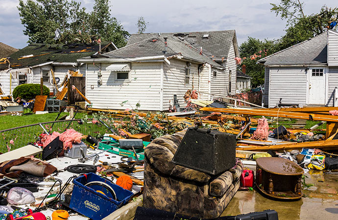 Tornado damage in a residential area where the tornado touched down.