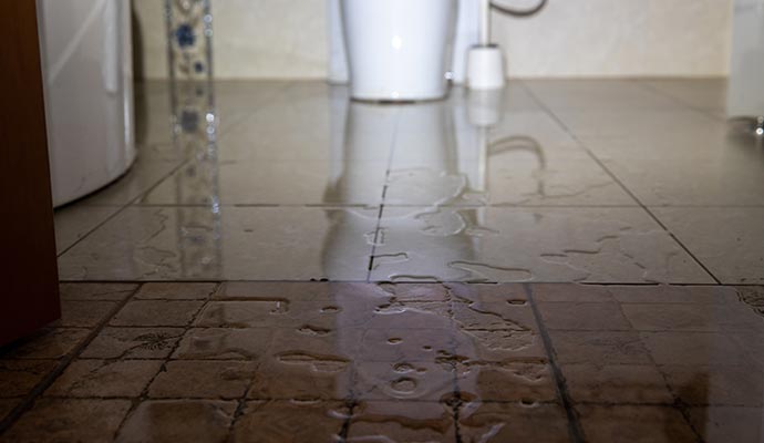 Bathroom plumbing leakage damaging floor Bathroom plumbing leakage damaging floor